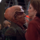 Kira and Quark share a friendly chat.